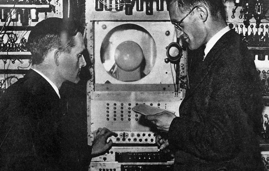 Freddie Williams and Tom Kilburn, the inventors of the Baby shown programming the Manchester Mk 1 computer